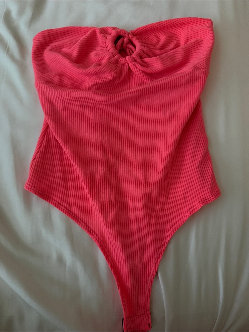 Woman’s Ribbed Neon Pink One-Piece Bodysuit